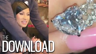 Cardi b is showing off the massive heart-shaped diamond ring she
received from offset for her birthday.