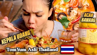Eating Tom Yum Hot & Sour Thai Soup, Cooked with Big Shrimp (Prawn)