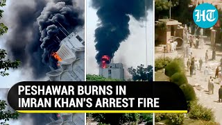 Peshawar On The Boil: Imran Khan supporters 'steal' weapons; Burn Radio Pak building | Watch