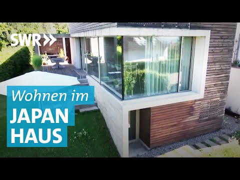 Video: Haus mit einem modernen und minimalistischen Look für zwei Familien