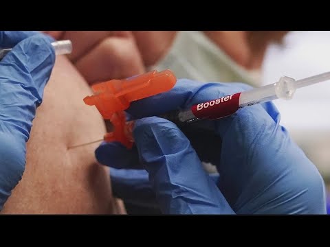 CDC panel unanimously votes to add COVID shots to recommended vaccines