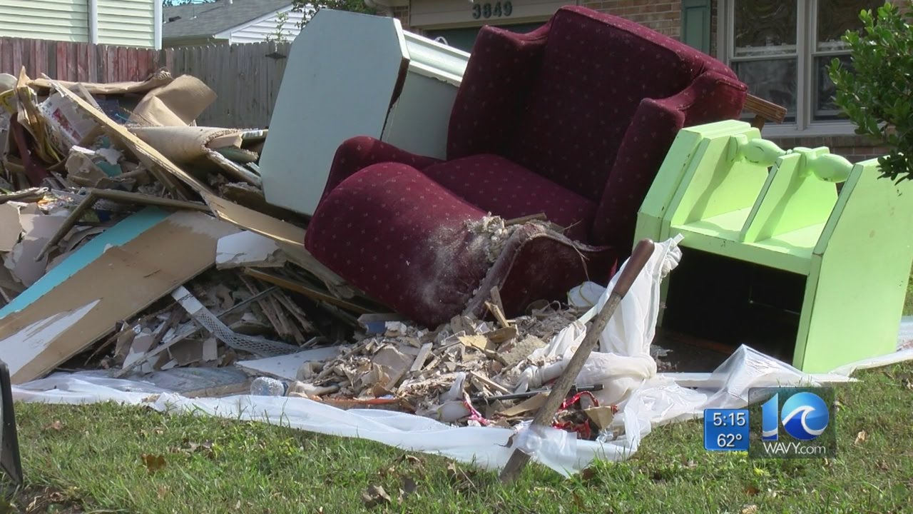 Residents cleaning up nearly a week after Hurricane Matthew - YouTube