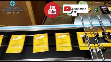 AUTOMATIC POUCHES FEEDING MACHINE