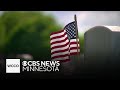 Volunteers gather to lay flags on every headstone at Fort Snelling National Cemetery