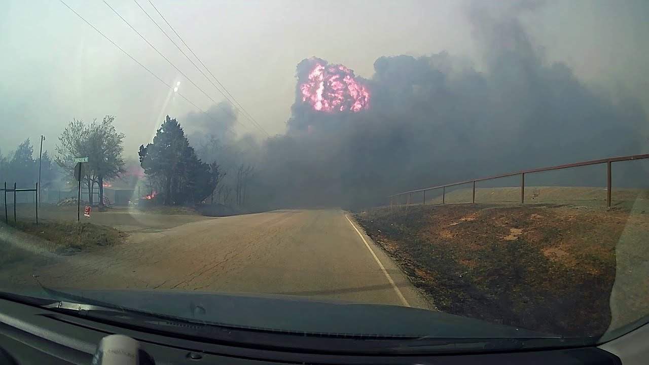 Huge Fireball after an Explosion at a Home Destroyed by Wildfire near