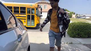 Christian is getting off the school bus