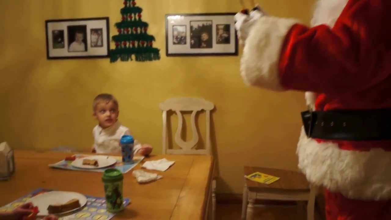 Santa makes a visit on Christmas Eve 2013