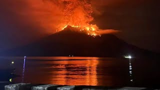 Tsunami alert after a volcano in Indonesia has several big eruptions and thousands are told to leave