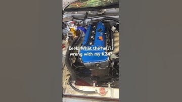 K24 Sounds like crap after new chain. Timing off? Valves bent?