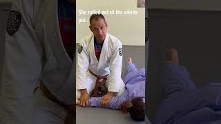 She rolled out of the aikido pin…