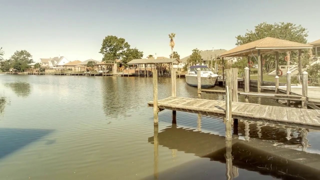 Beautiful waterfront Acadian home in Eden Isles! 200 Intrepid Drive