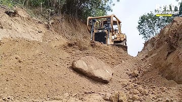 Highly Experienced D6R XL CAT Bulldozer Operator Leveling Cliffs for Plantation Roads