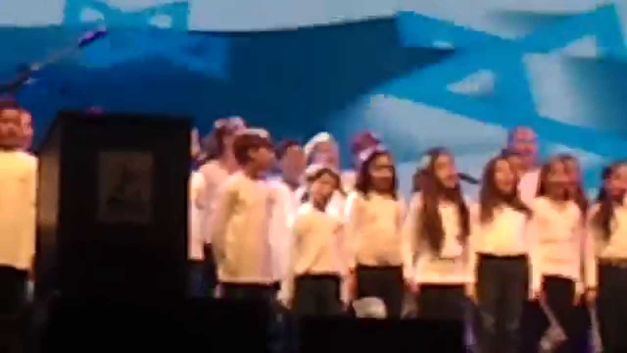 Ravid sings in the school's quire