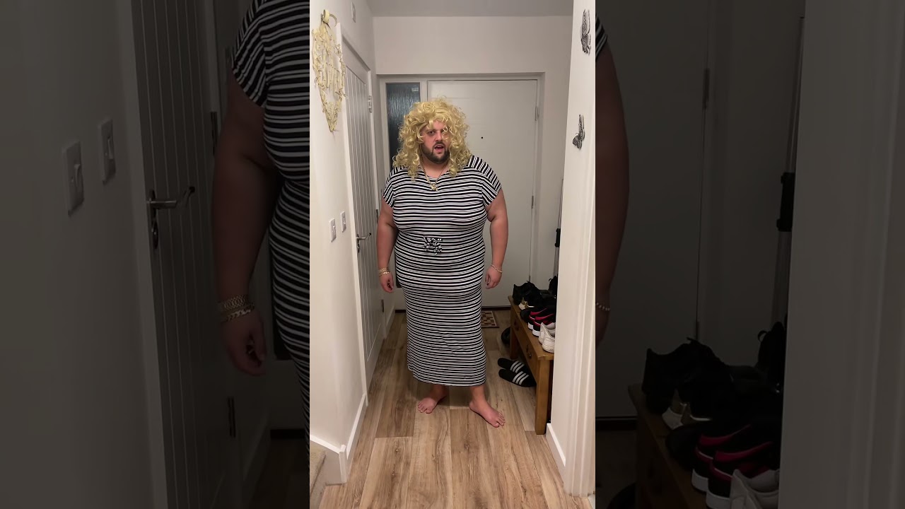 Funny Cross-dressing Video: Man in Wig and Striped Dress Makes Hilarious Exit