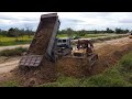 Dump Truck Unloading Soil And Amazing Bulldozer Push The Ground