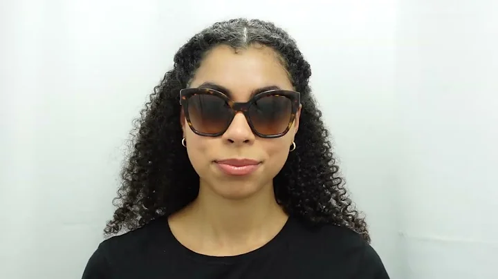 Woman model wearing Prada 17ZS VAU6S1 54mm Sunglasses