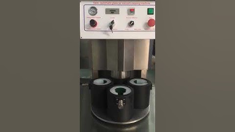 Semi-automatic vacuum capping machine