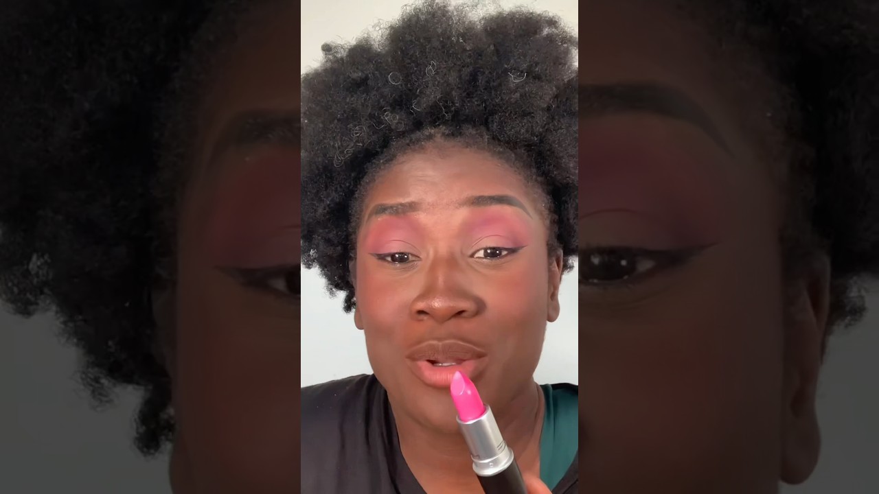 Hot pink lipstick on dark skin