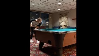 Guy Strikes Billiard Ball Out Of The Whole Table