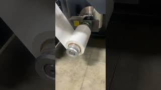 Static electricity, stock material rolling onto the press to be printed.