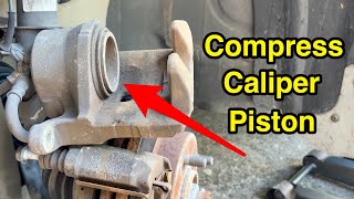 Easy: how to push back brake caliper piston.