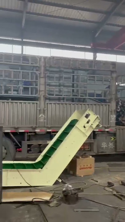 NE Plate Chain bucket elevator with the scrap conveyor
