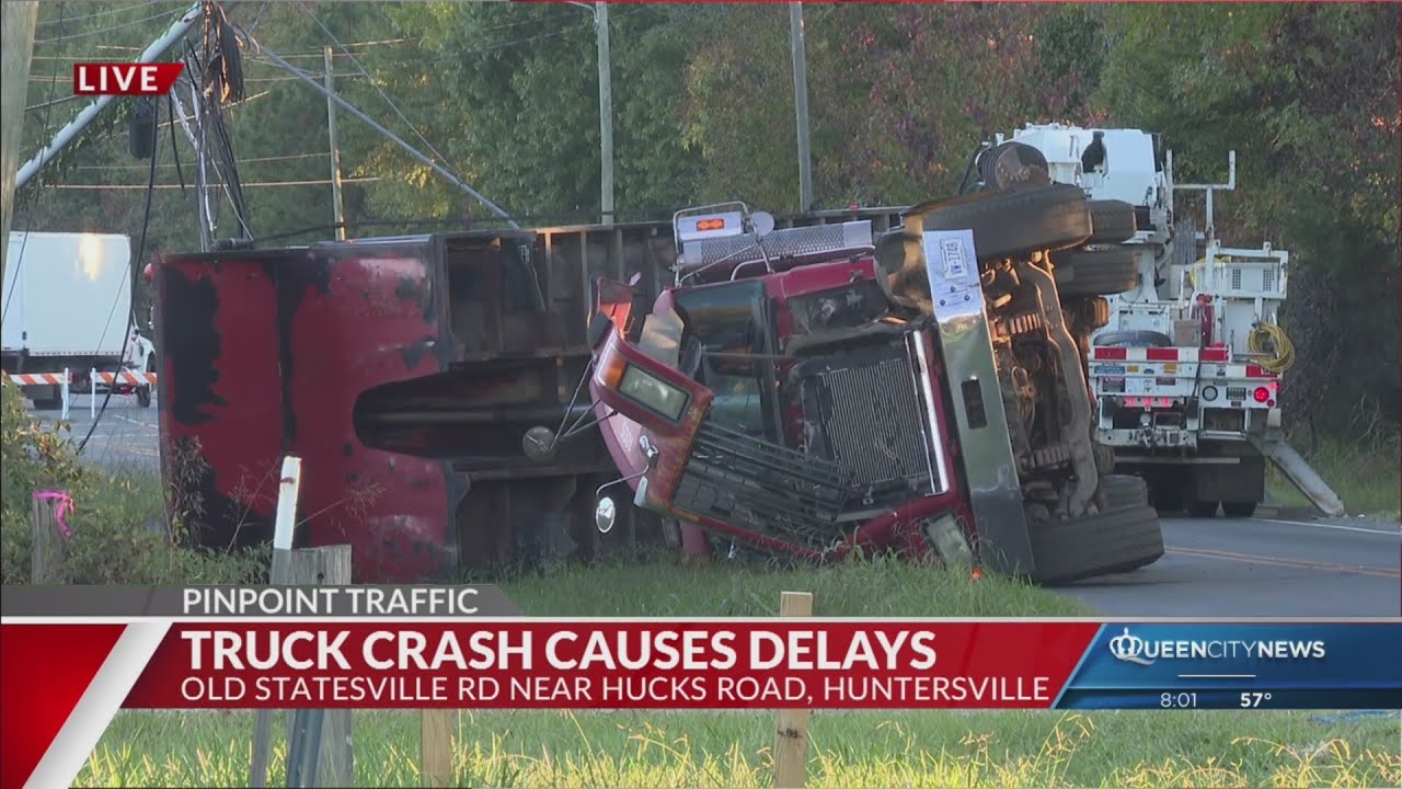 Overturned dump truck takes down power lines south of Huntersville ...