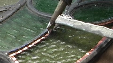 Leadlight window repair. Fixing broken glass.