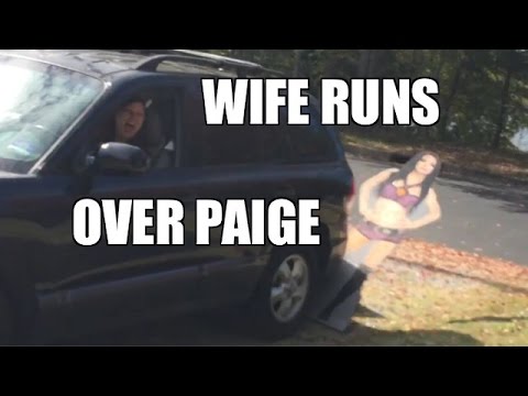 HEEL WIFE RUNS OVER PAIGE STANDEE - YouTube