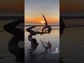 Flips and yoga on the beach with Britt Hertz 🌊🧡 #yogashorts #beachyoga #flips