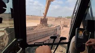 Take a look inside the cab of a CAT 320 GC excavator.