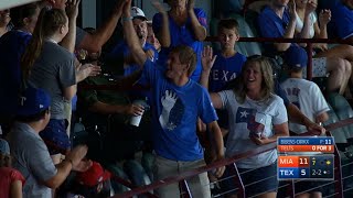 MIA@TEX: Fan bobbles, recovers for barehanded catch