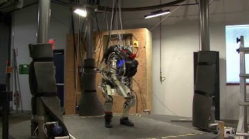 MilitarySkynet.com News - DARPA Bad Ass Robot Masters Stairs - pushups - walking - petman