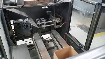 Wepackit case erector former, erects cases and seals bottom by tape