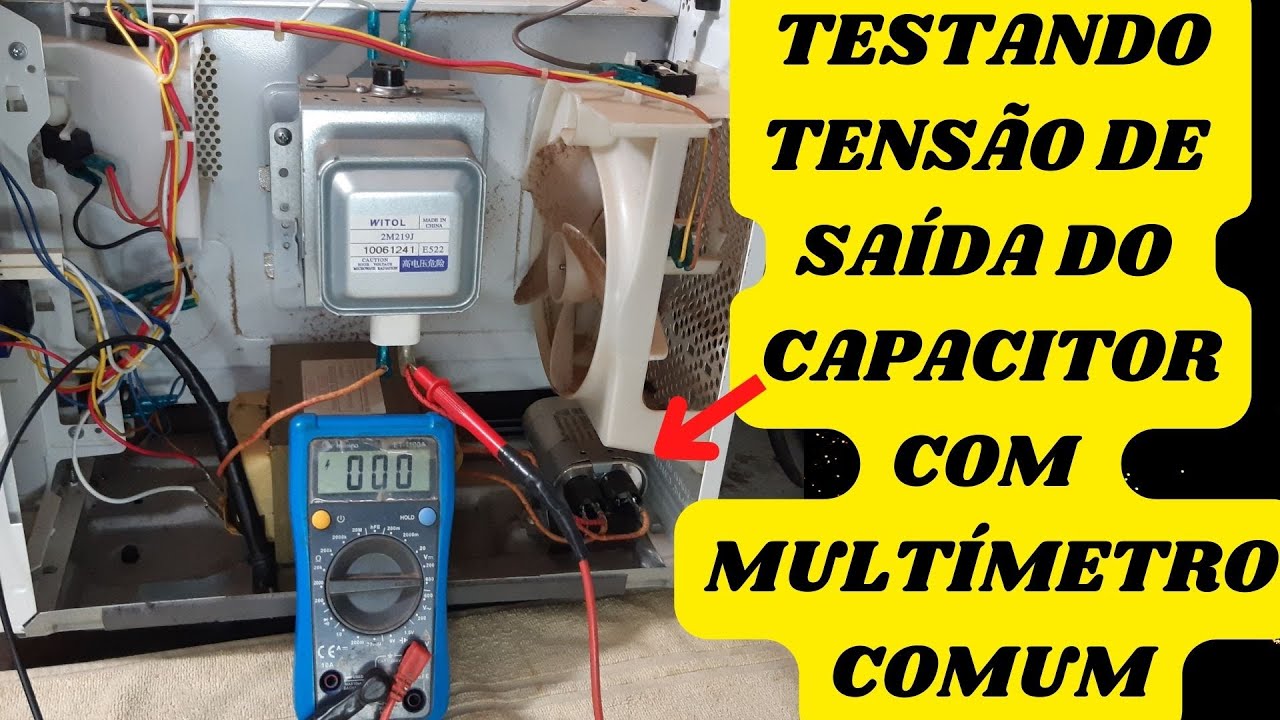 veja como testar a alta tensão que sai do capacitor do microondas usando um multímetro comum