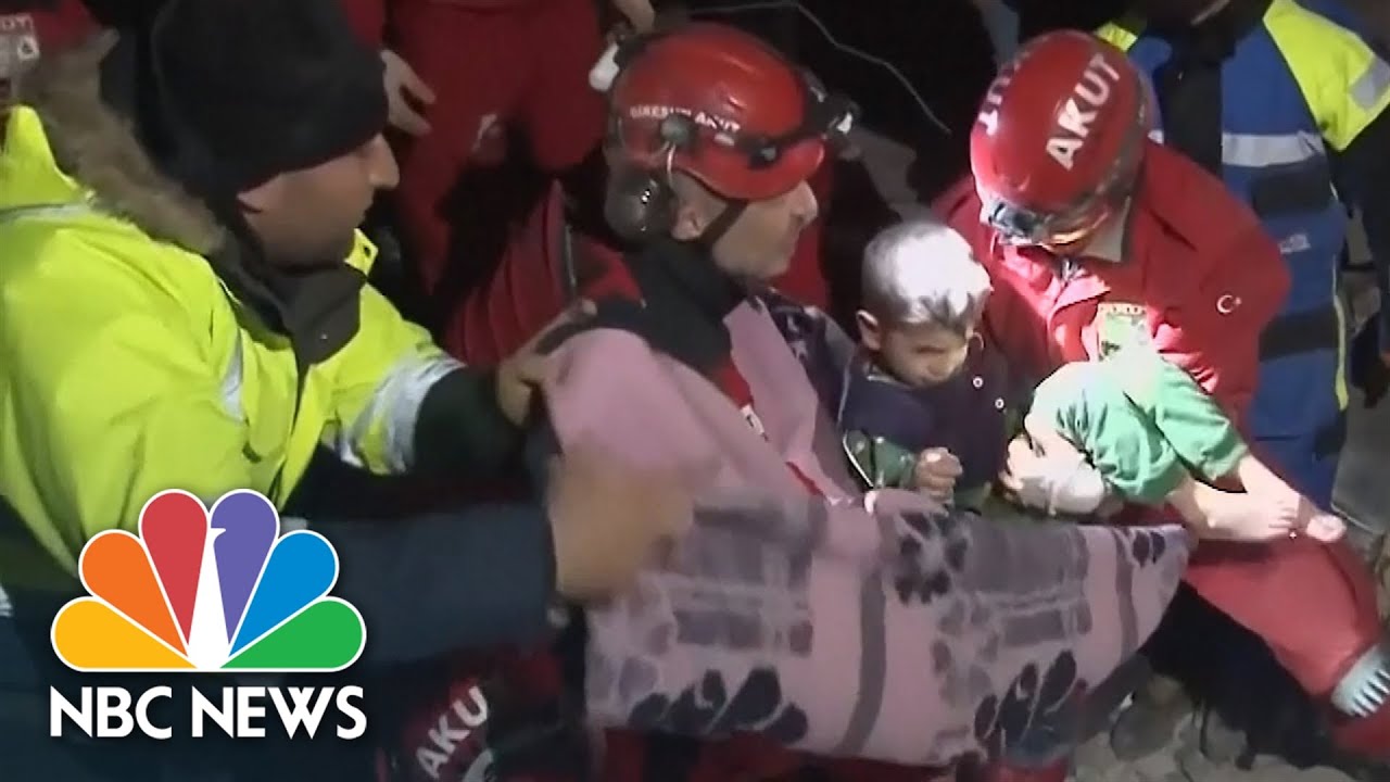 Video shows mom and young son saved from collapsed apartment