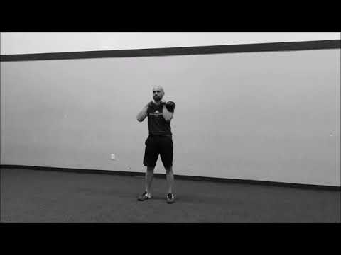 Offset Racked Kettlebell Squat - YouTube