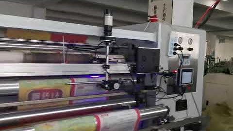 QR code dynamic database UV coding on rolling plastic film on rewinder machine