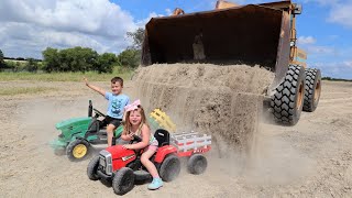 Using kids tractors and real tractors to dig dirt | Playing in dirt and water | Tractors for kids