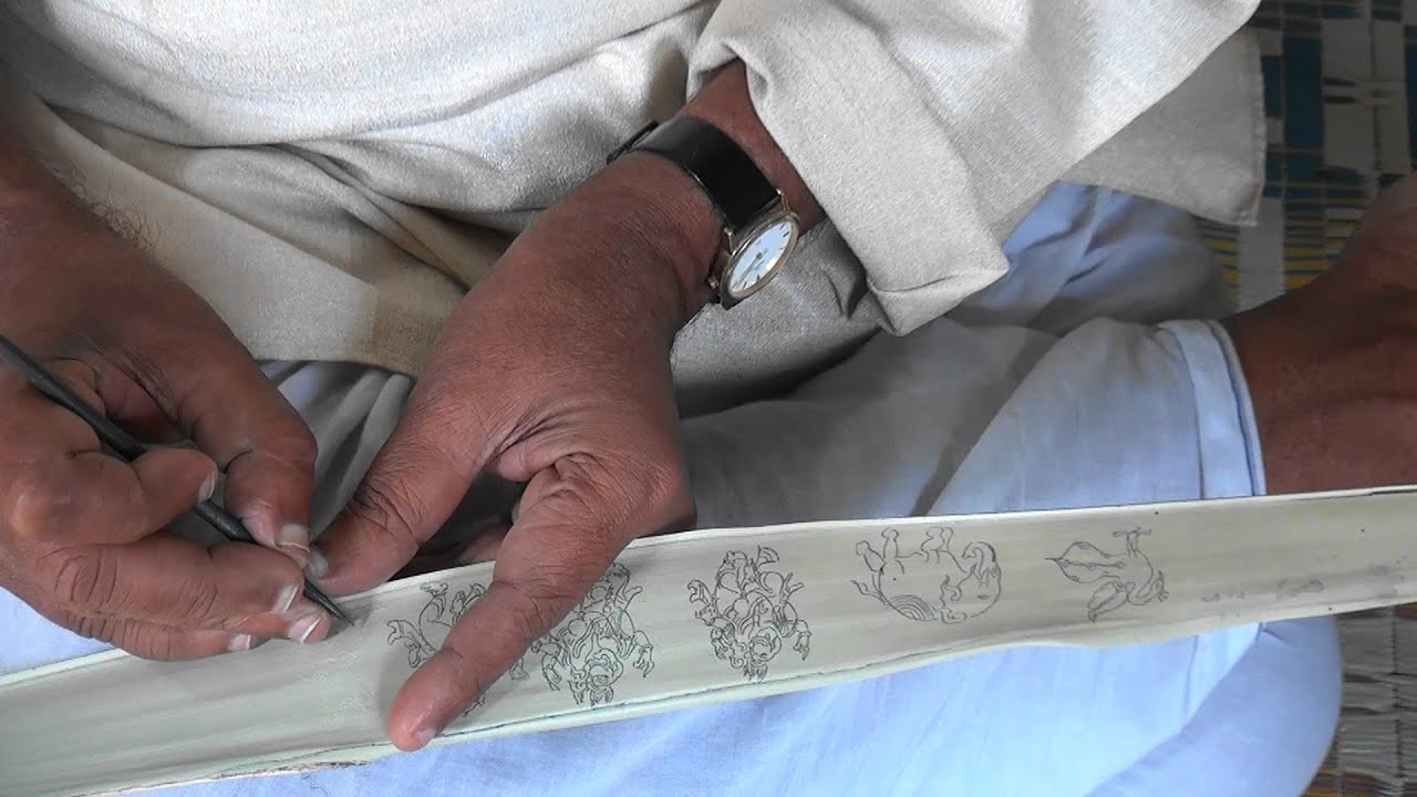 Изображение на пальмовых листьях [Тала Паттачитра], Наяк Патна, Одиша, Индия: божественное искусс...