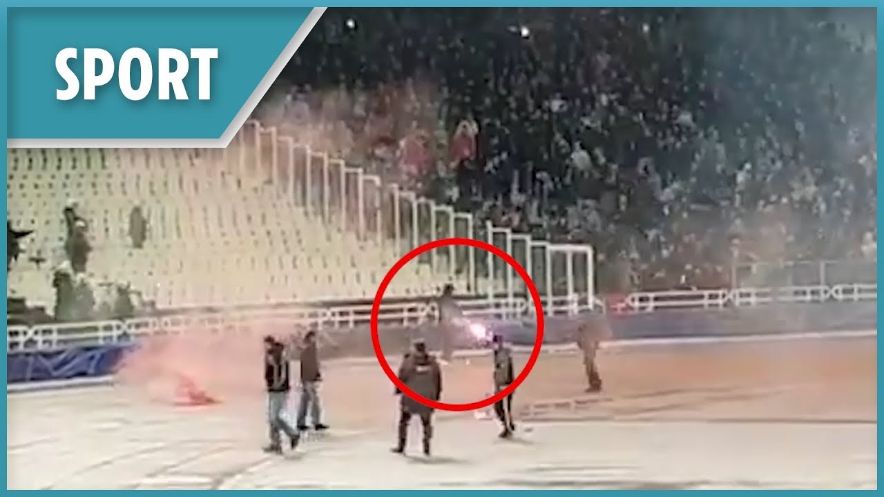 AEK Athens fans throw petrol bomb and fireworks at Ajax supporters - YouTube