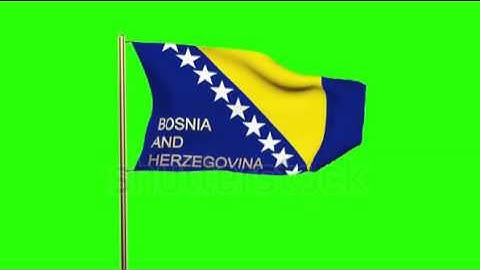 Bosnia and Herzegovina flag with title waving in the wind. Looping sun rises style. Animation loop