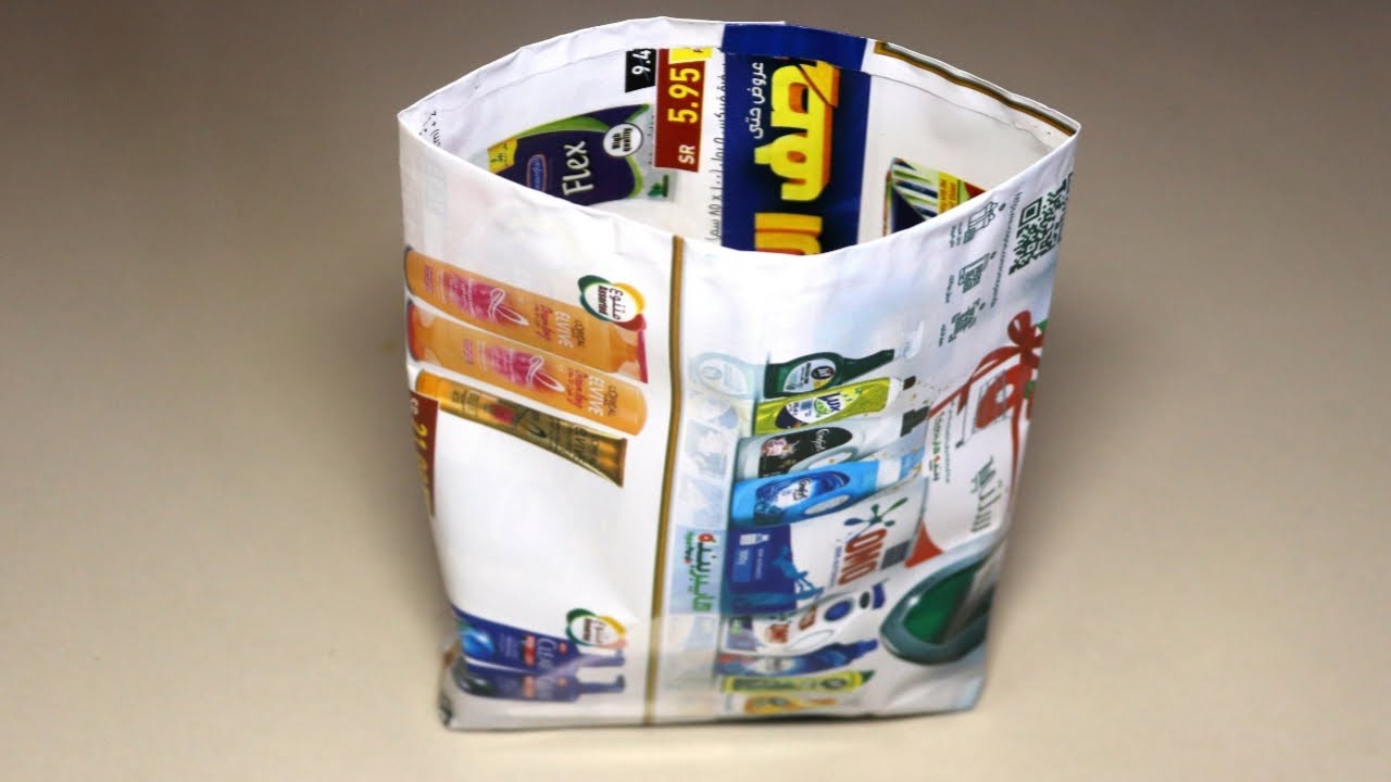 newspaper cover making in tamil / waste paper bag in tamil YouTube