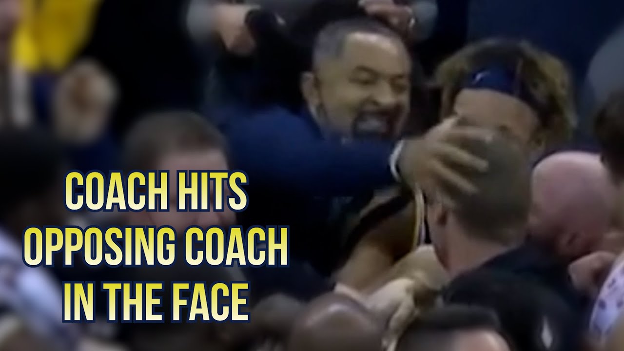 Michigan Coach hits Wisconsin Coach in the face, a breakdown - YouTube