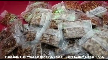 #CHIKKI PACKING MACHINE. PLC BASED SERVO SYSTEM, MODEL-  POLO