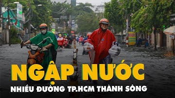 Mưa lớn giữa trưa ở TP.HCM, nhiều đường thành sông