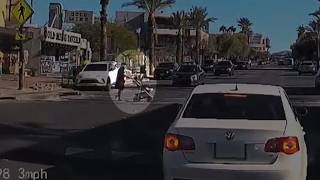 VIDEO: Pedestrian with baby stroller crosses street after some drivers ignore pedestrian lights