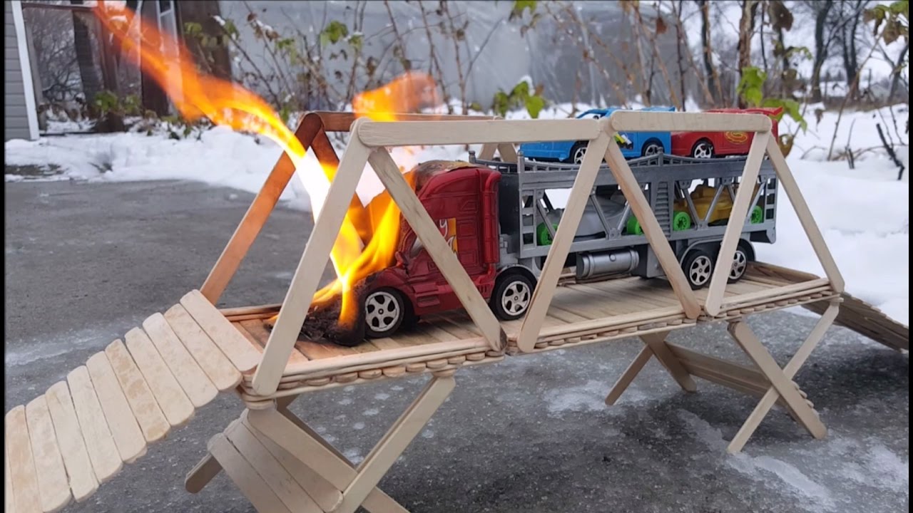 Car transporter ENGINE FIRE burns down bridge