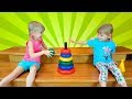 Alena and Pasha play with color toys