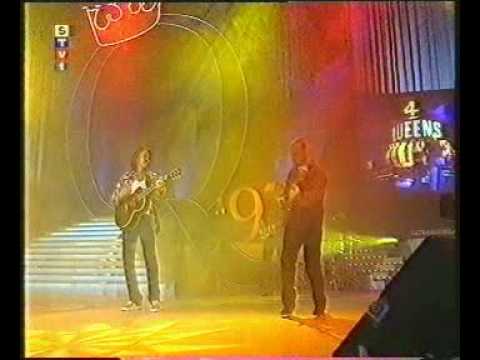 Paul Young feat.Otto Fothy jr and his Cross The Ro...